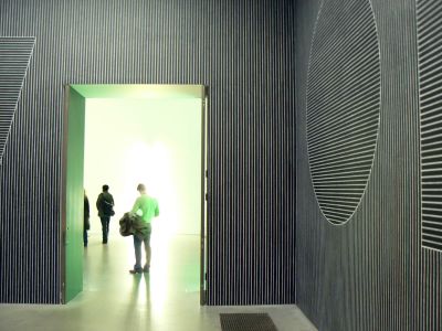 Private tour group discussing contemporary artworks at Tate Modern museum