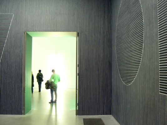 Private tour group discussing contemporary artworks at Tate Modern museum