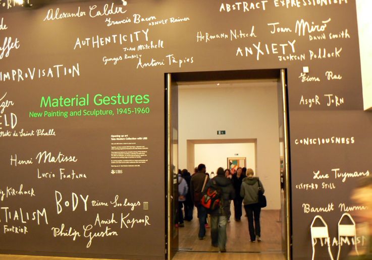 Visitors on a private tour exploring the galleries at Tate Modern London