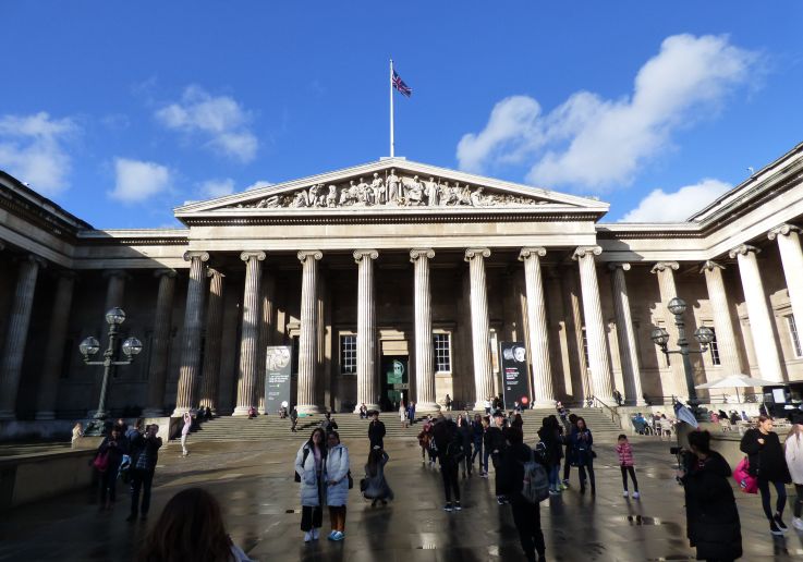 British Museum entrance with visitors walking across the courtyard
