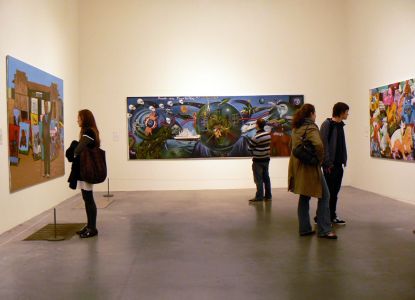 Guests enjoying a personalized art experience in Tate Modern's exhibition spaces