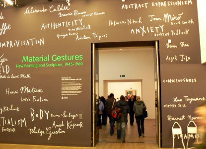 Visitors on a private tour exploring the galleries at Tate Modern London
