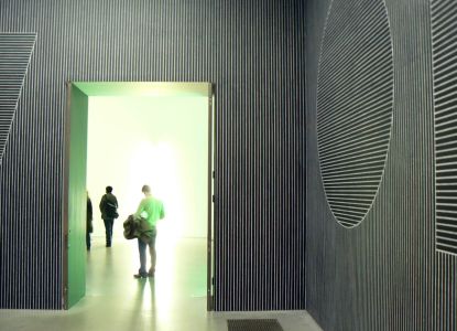 Private tour group discussing contemporary artworks at Tate Modern museum