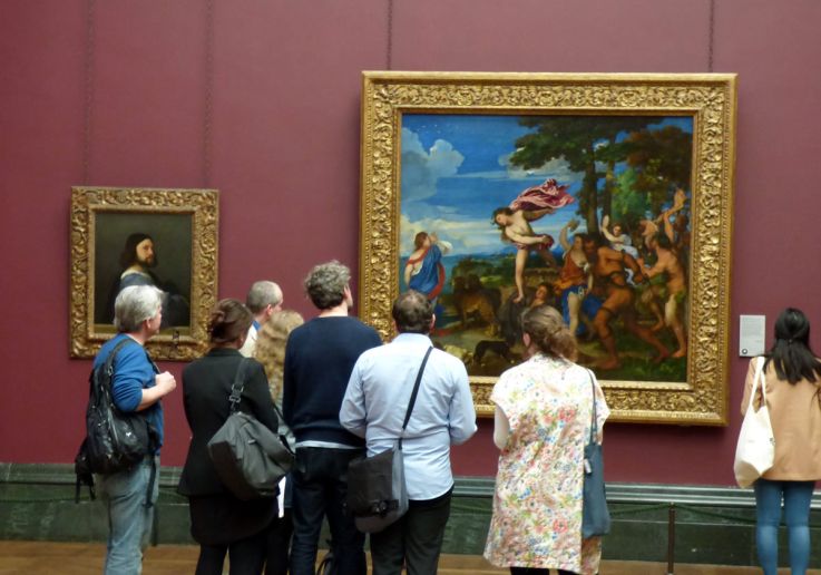 Small group on a private tour admiring Renaissance art at the National Gallery