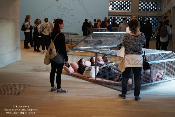 Visitors interacting with a contemporary art installation at Tate Modern in London