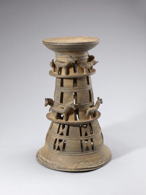 Tall pierced stoneware pedestal stand ringed by modelled animals from Korea, AD 400–500