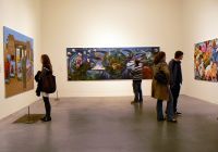 Guests enjoying a personalized art experience in Tate Modern's exhibition spaces