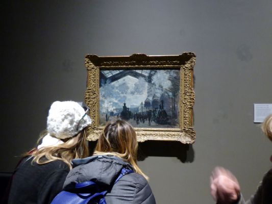 Visitors engaged in a private tour of the National Gallery with a personal guide