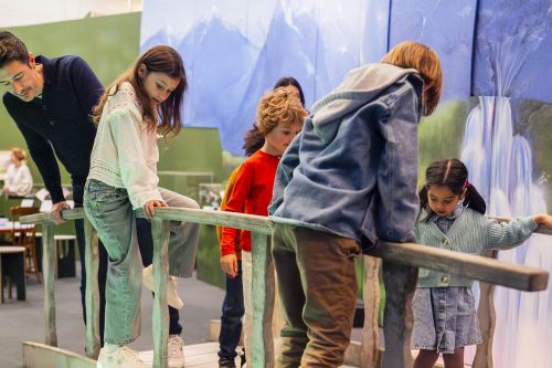 Families visiting the Fairy Tales exhibition at the British Library in London