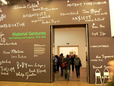 Visitors on a private tour exploring the galleries at Tate Modern London