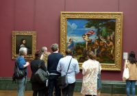 Small group on a private tour admiring Renaissance art at the National Gallery