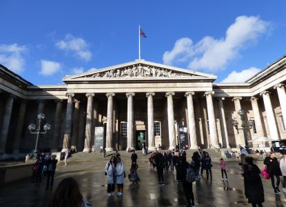 British Museum entrance with visitors walking across the courtyard