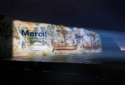 Bayeux Tapestry ships projected onto the white cliffs of Dover