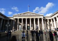 British Museum entrance with visitors walking across the courtyard