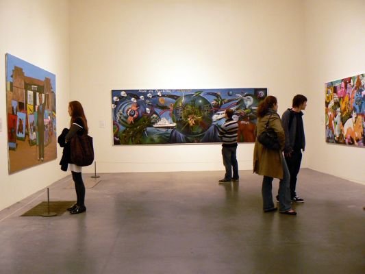 Guests enjoying a personalized art experience in Tate Modern's exhibition spaces