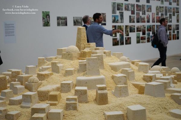 Art installation resembling a cityscape model inside Tate Modern in London
